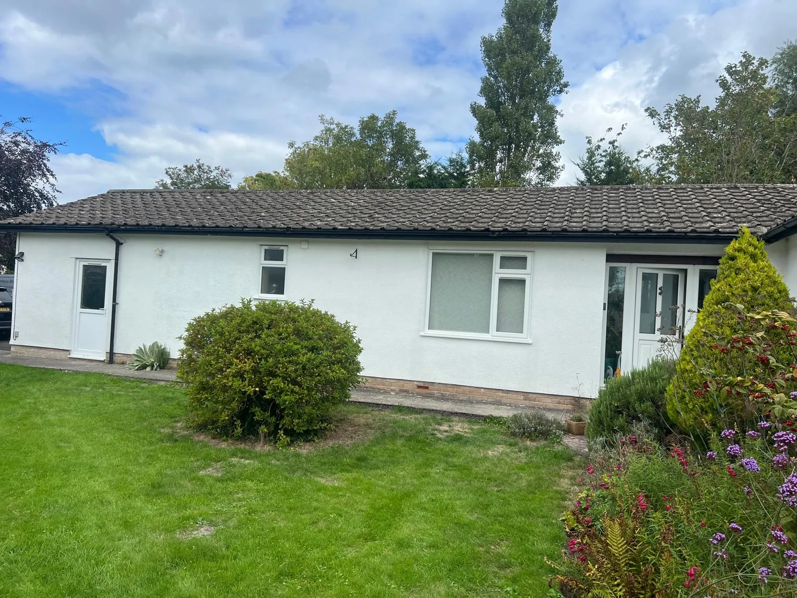 Bungalow with freshly painted white exterior walls