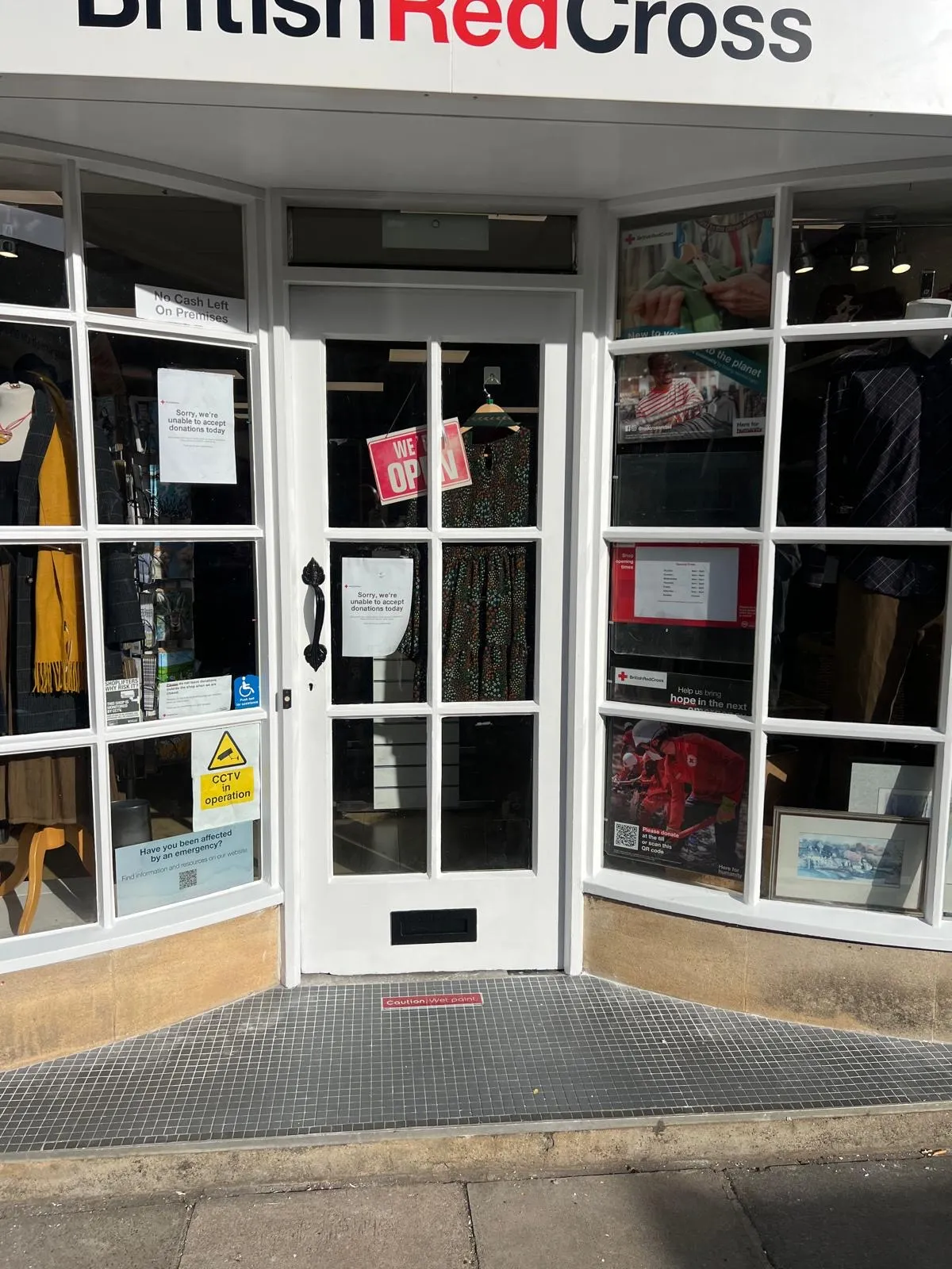 Shop entrance with freshly painted door and window frames