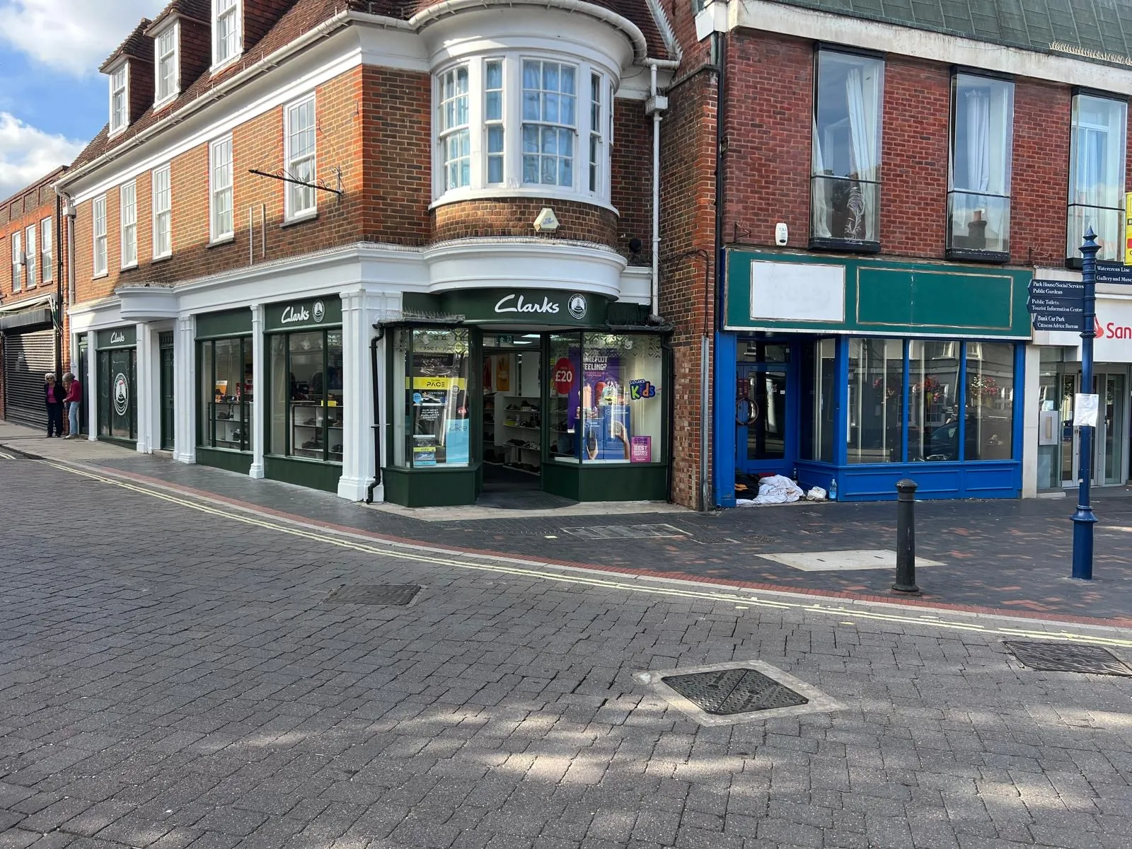 Period shop front on a corner of a brick high street building